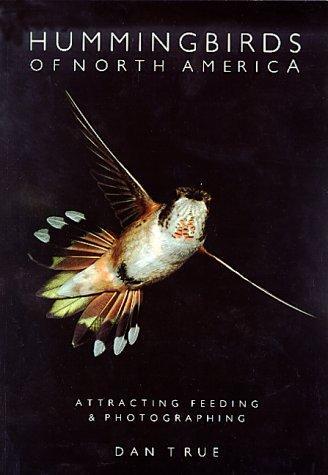 Cover of Hummingbirds of North America. A hummingbird is prominently on the cover with a black background. 