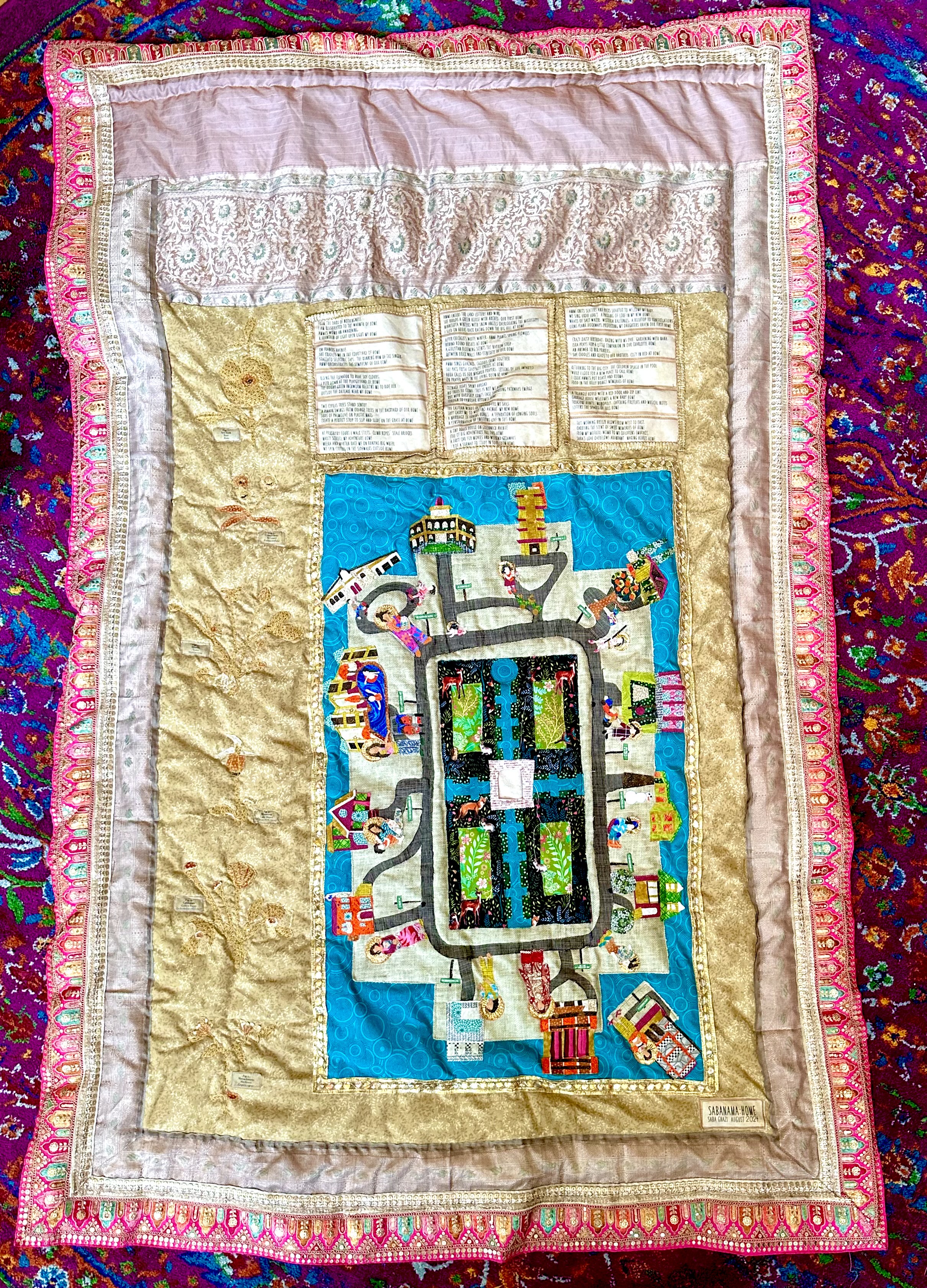 Quilted fabric depicting family scenes from the artist's personal life growing up as an Indian Muslim American