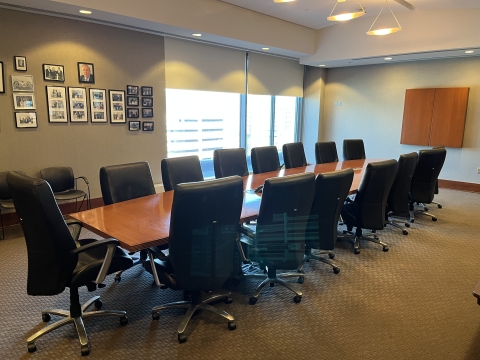 Riverfront board room with table and chairs