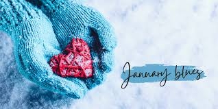 image of hands in gloves holding a heart in the snow