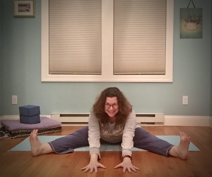 Photo of Louise Fecher stretching