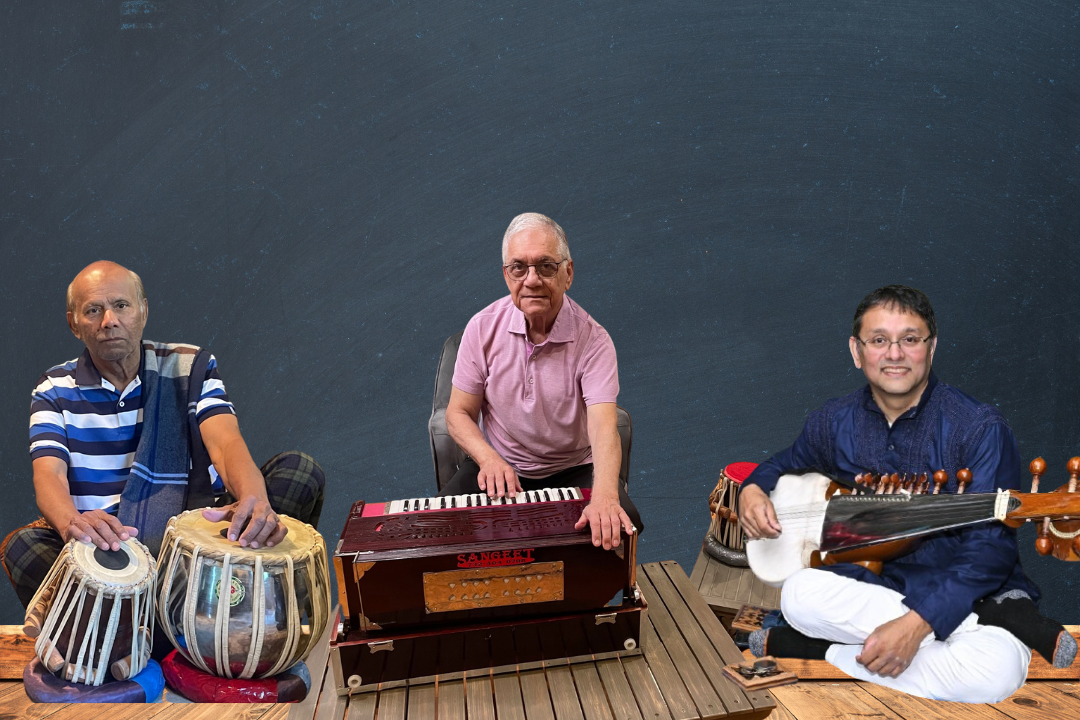 three musicians playing indian instruments